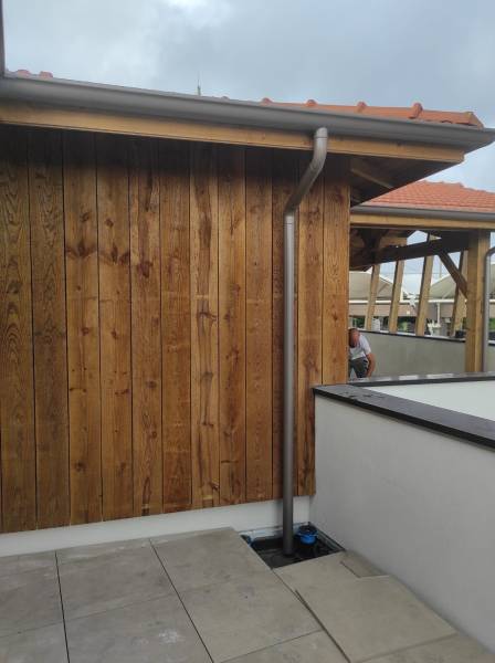 Pose de descentes et de dauphins sur mesure de couleur bronze de diamètre 80 pour évacuer les eaux pluviales à Parentis-en-Born