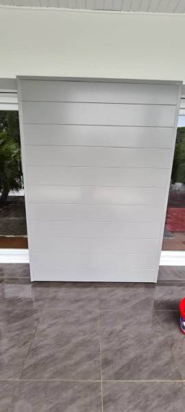 Habiller la façade d'une maison à Saint-Pierre-Du-Mont