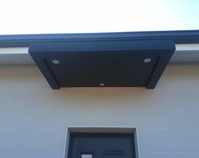 Pose de marquises en aluminium pour une résidence neuve à Biscarrosse