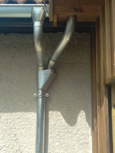 Installer des chéneaux et des gouttières en zinc sur une façade située près d’Orx